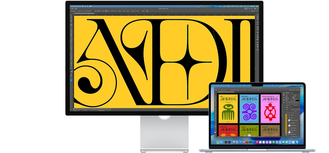 شاشة Studio Display وجهاز لابتوب Mac يعرضان مشروعاً قيد الإنجاز في برامج Adobe متعددة، شاشة Studio Display تعرض لقطة مقرّبة لنص أسود على خلفية بلون أصفر دافئ، الطبقة المضادة للانعكاس تساعد على تقليل الوهج