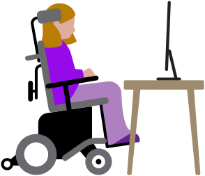 Una persona en una silla de ruedas motorizada mira un computador Mac ubicado en un escritorio