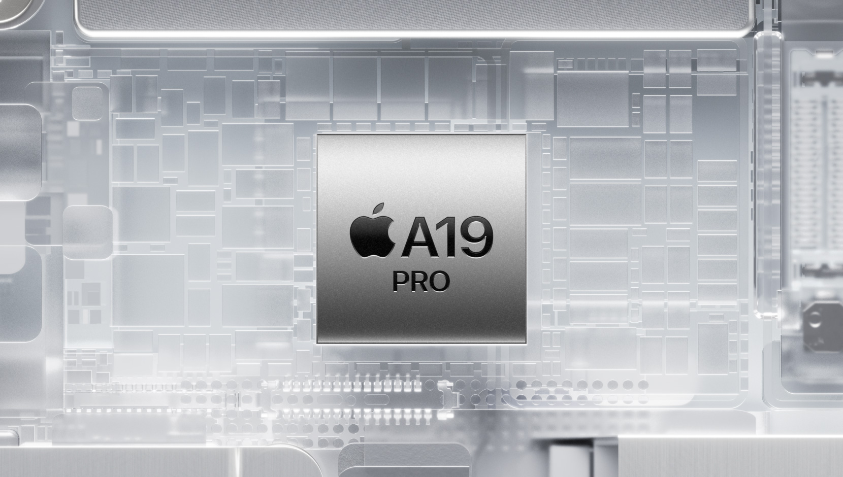 Čip A19 Pro je obklopený žiariacimi vnútornými komponentmi iPhonu
