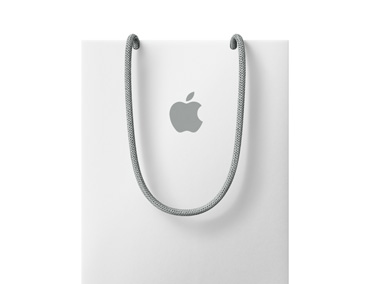白色 Apple 購物袋，靠近頂端有 Apple 標誌